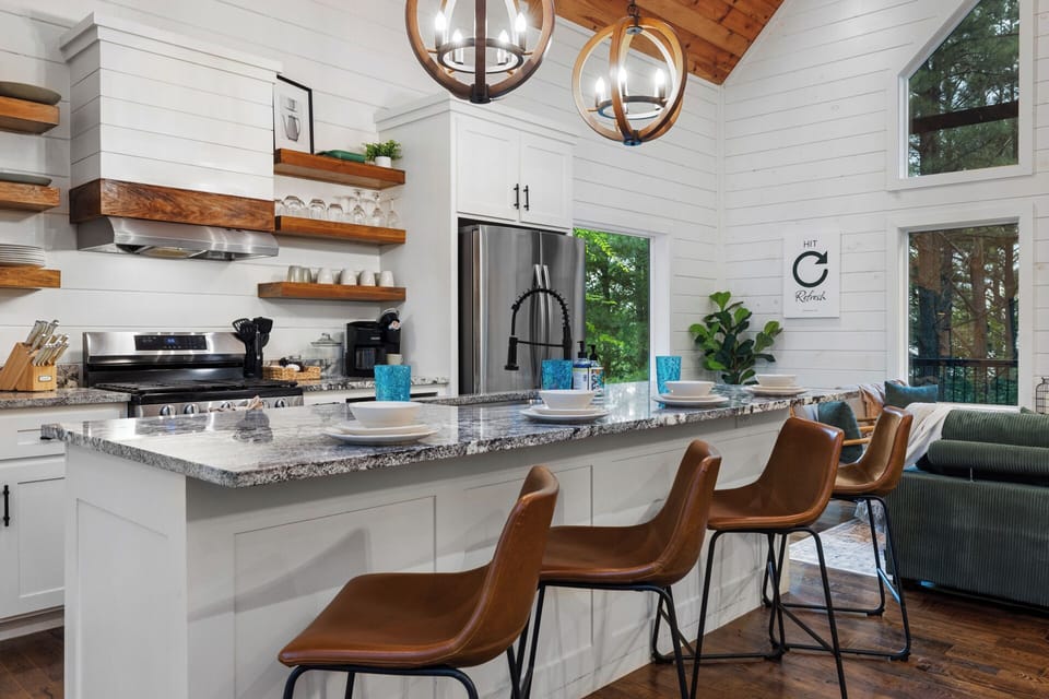 Bright, cozy, and ready for everything from brunch spreads to midnight snacks. 
Because the best cabin kitchens are not just for cooking, they’re where everyone somehow ends up gathering.