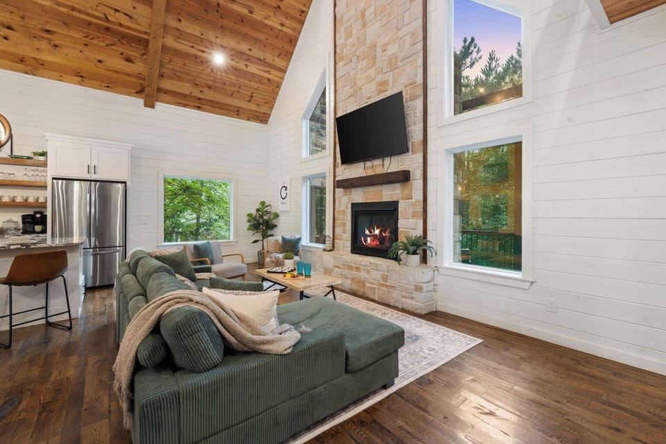 The heart of the cabin, where comfort and connection come naturally. 
From movie nights on the couch to quiet mornings by the fire, this space was designed for slowing down beautifully.