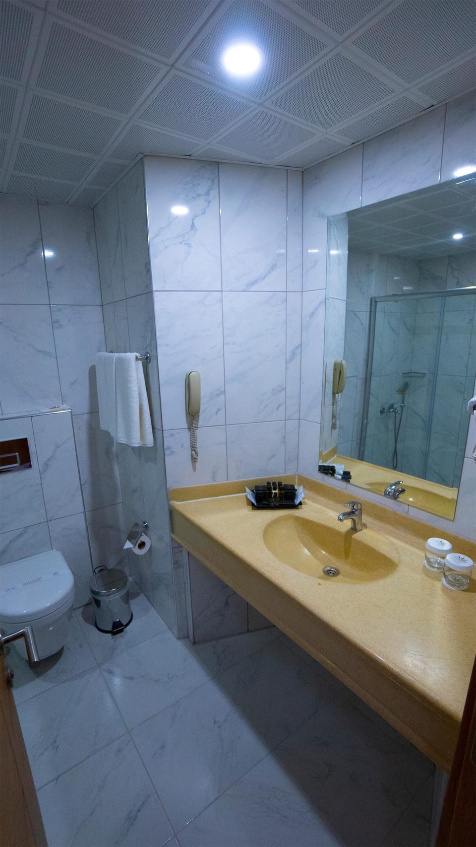 Shower, eco-friendly toiletries, hair dryer, towels