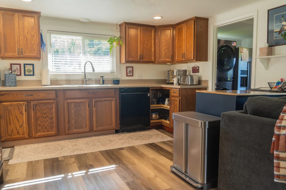 A functional kitchen with clean lines and thoughtful details, perfect for preparing meals and gathering around.