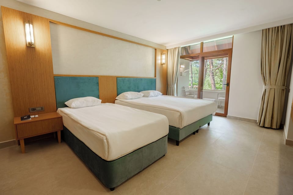 Garden Chalet room | Select Comfort beds, minibar (some free items), in-room safe