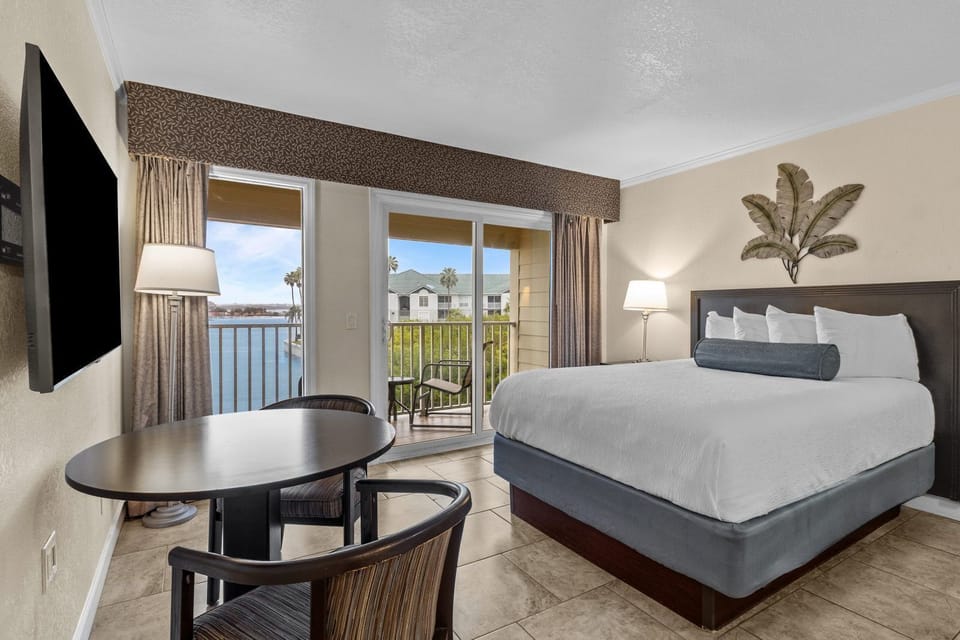 Step inside a spacious suite, where a large window invites sunshine and offers stunning views.