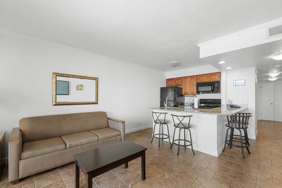 Enjoy an open layout in this spacious suite, blending comfort with functionality for your perfect stay.