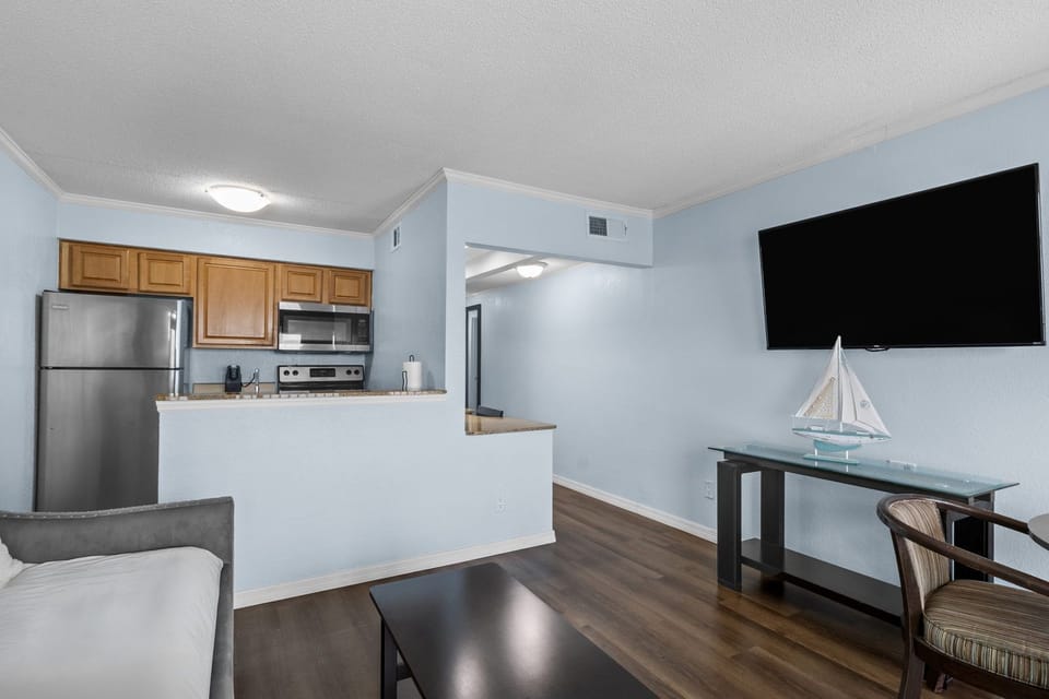 Whip up your favorite meals in the full kitchen, complete with modern appliances and stylish finishes.