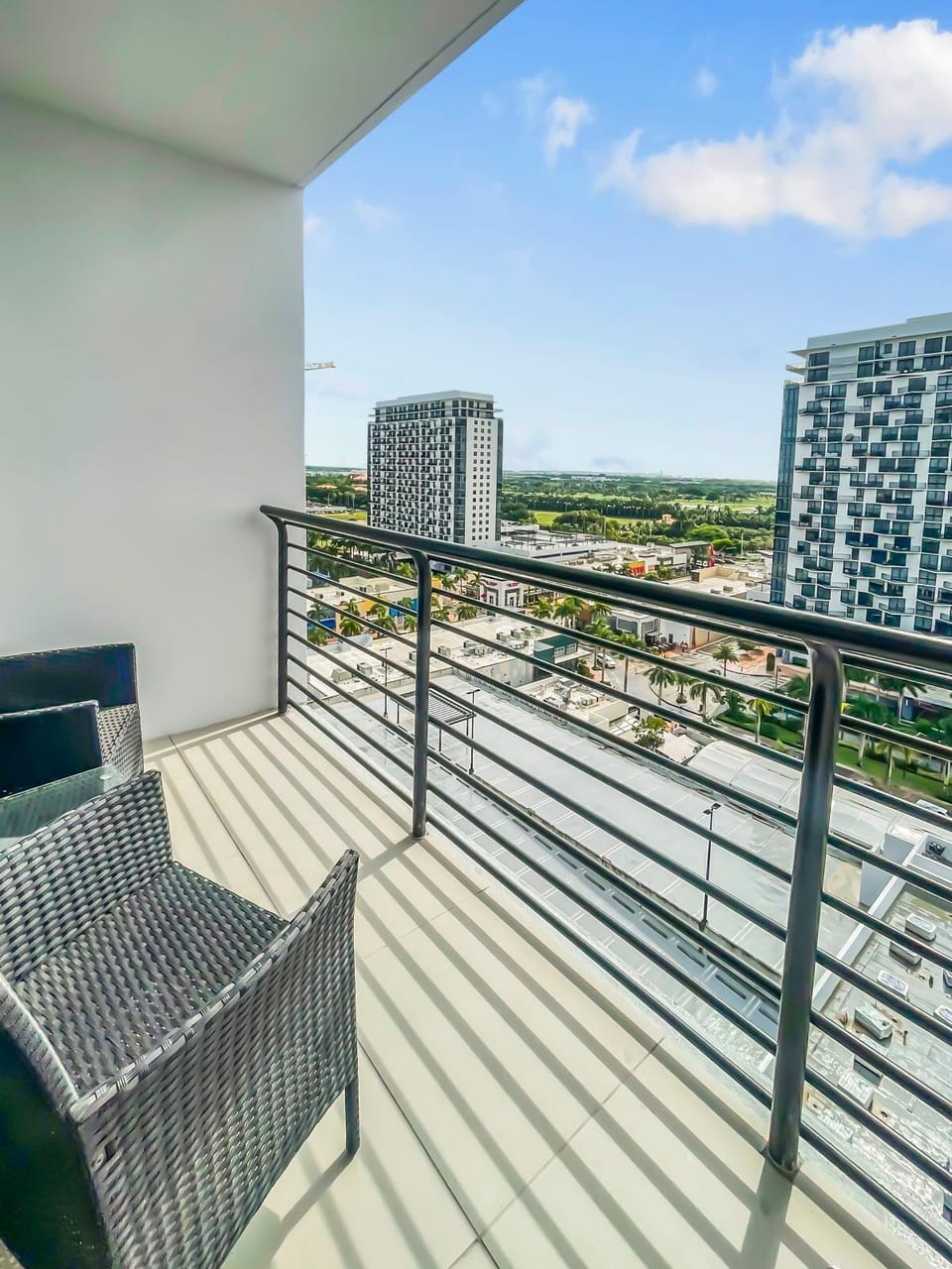Step onto the private balcony and enjoy a morning coffee with city views.