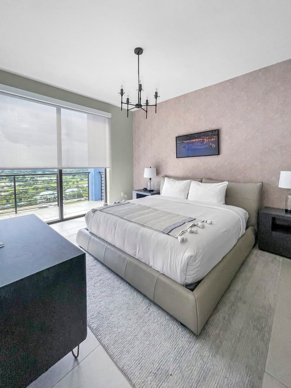 Wake up in style with contemporary decor, a cozy atmosphere, and a view that beckons you to step outside.