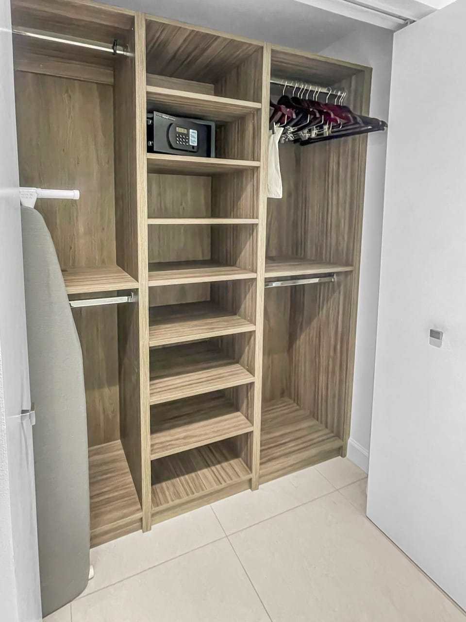 Stay organized with ample closet space, including shelves and hangers for your belongings.