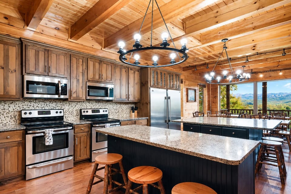 Gourmet kitchen with stainless steel appliances, custom wood cabinetry, granite countertops, and spacious island seating for family meals and entertaining.