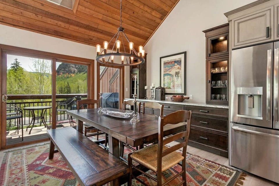 Elegant dining space with custom built in buffet and walkout patio
