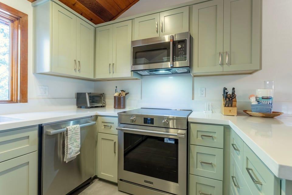 Kitchen is fully stocked with everything needed to cook a nice meal.