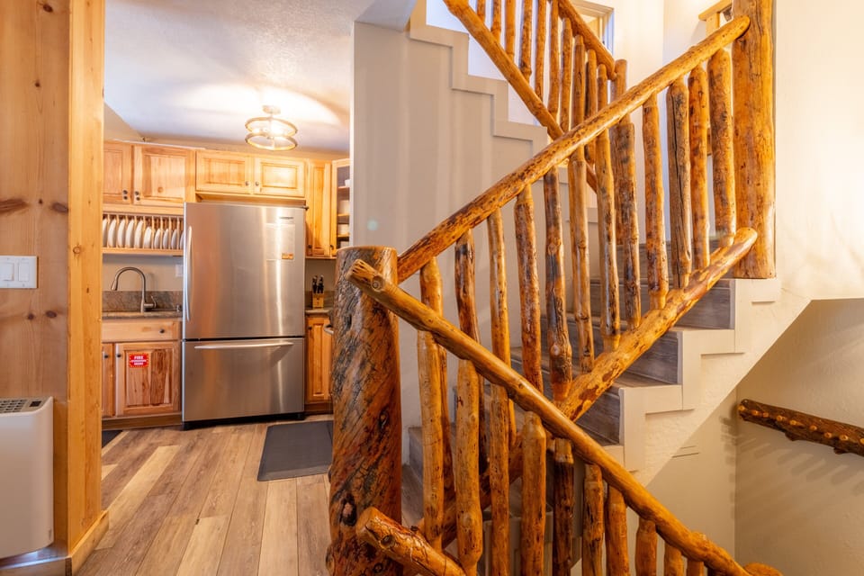 Split level condo - stairs leading to loft and bottom level.