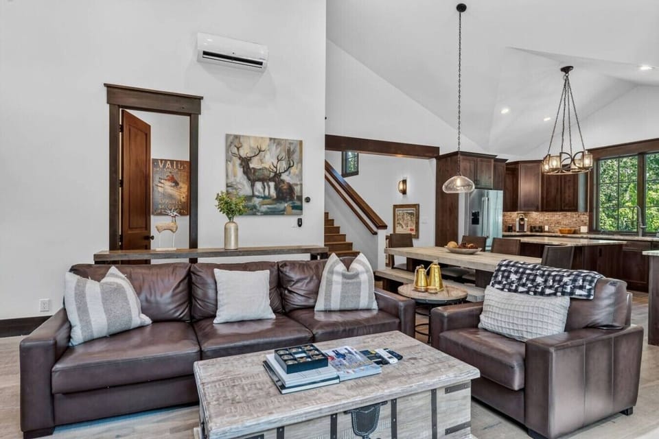Living room with fireplace, Smart TV and tons of natural light
