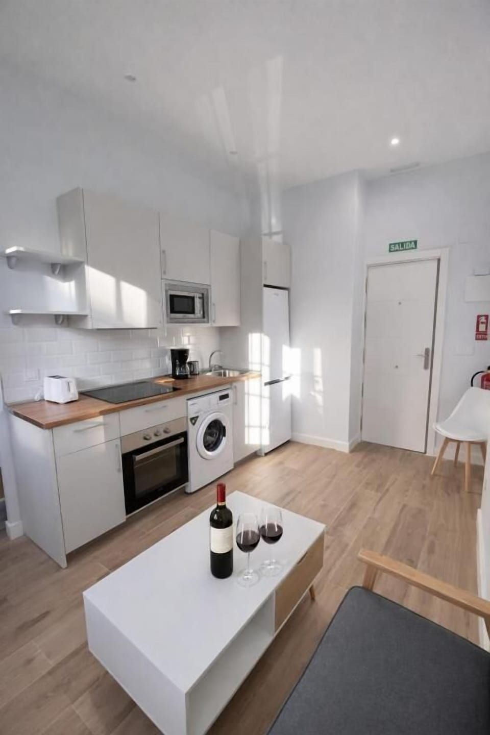 Classic Apartment | Private kitchen | Toaster, cleaning supplies