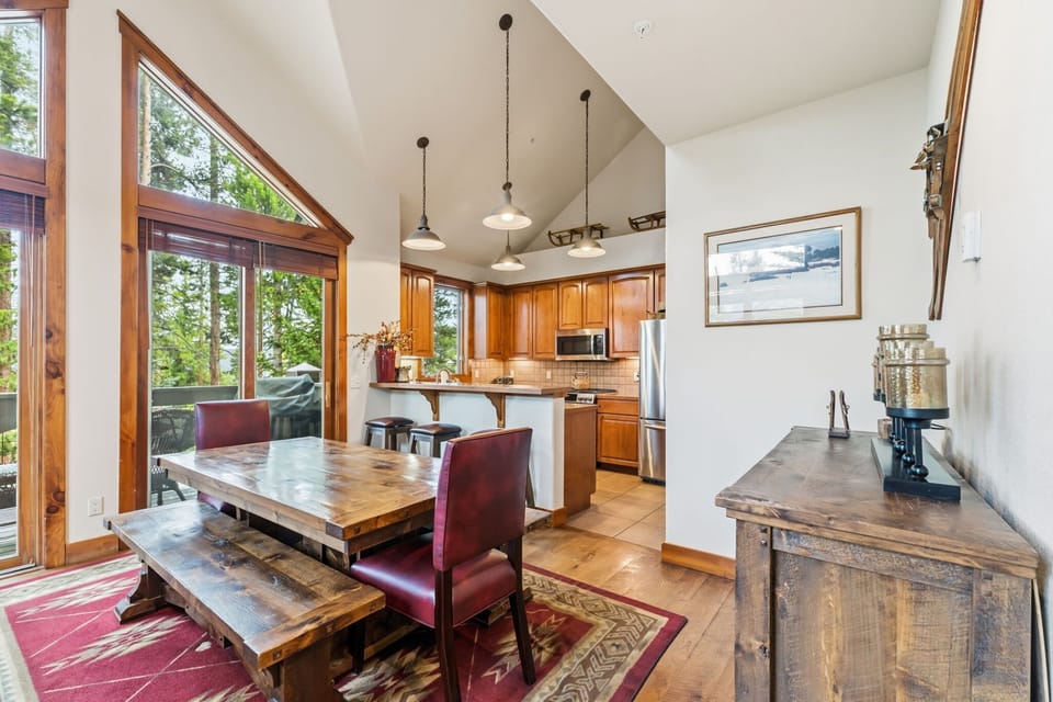Dining area: Dining table with seating for 8, breakfast bar with 3 barstools
