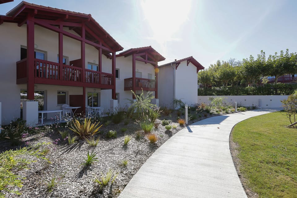 Arrive to beautifully landscaped grounds and classic Basque architecture — the welcoming setting of Le Domaine d'Uhaina, where space and comfort await groups of up to eight.