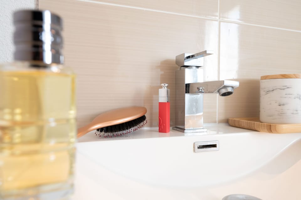 Fresh and functional, the bathroom has everything your family needs for a comfortable stay.