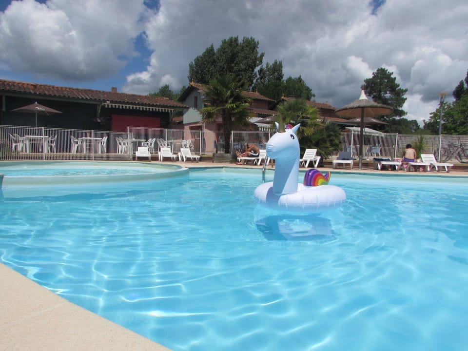 Colourful floats and a children's pool area make the outdoor aquatic space a favourite for families all summer long.
