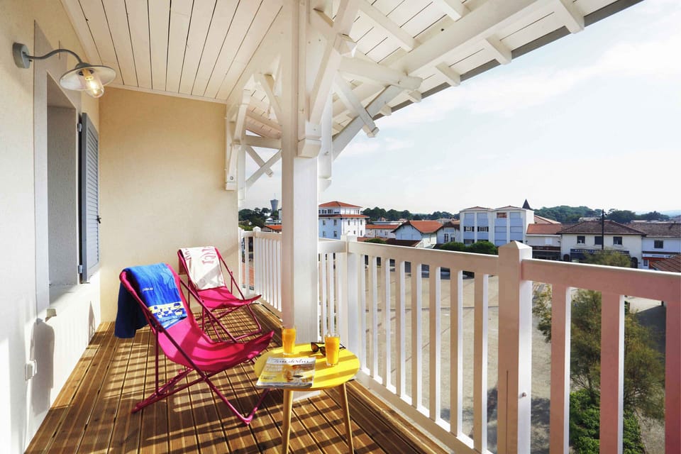 Sip your drink and soak in the coastal breeze on your private balcony.