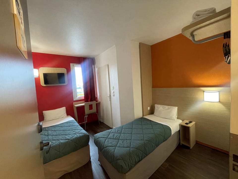 Desk, free WiFi, bed sheets