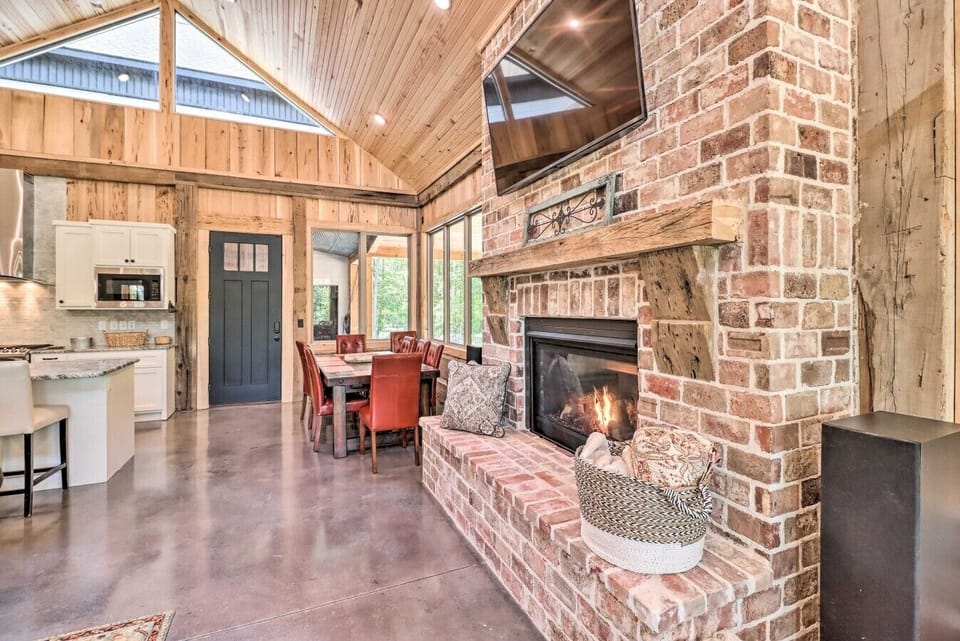 Living Room | Leather Sofas & Brick Fireplace | Cozy, Open Atmosphere