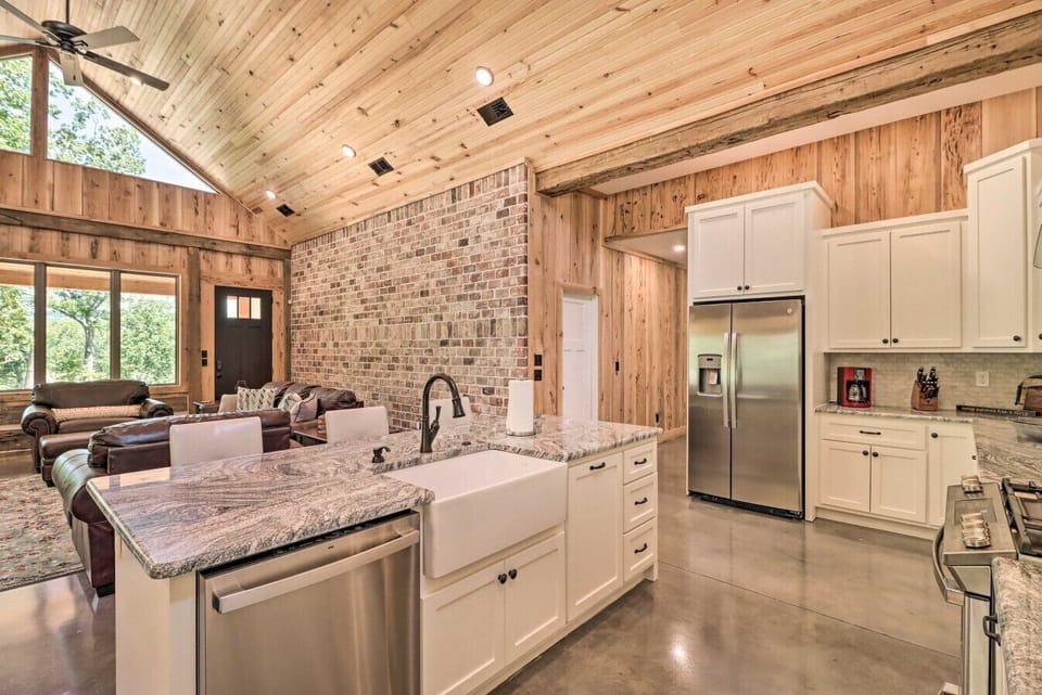 Kitchen | Spacious Kitchen with Stylish Granite Island | Perfect for Cooking & Entertaining