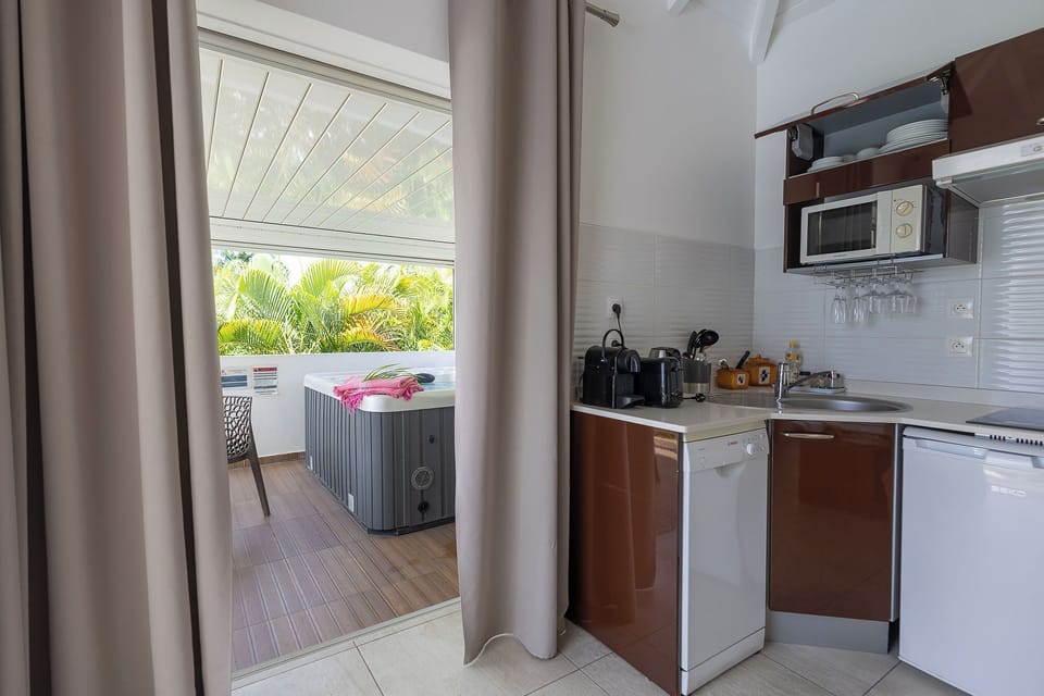 Premium Suite, 1 Bedroom, Hot Tub (Suite Air: Alize) | Private kitchen | Espresso maker, coffee/tea maker, microwave, stovetop