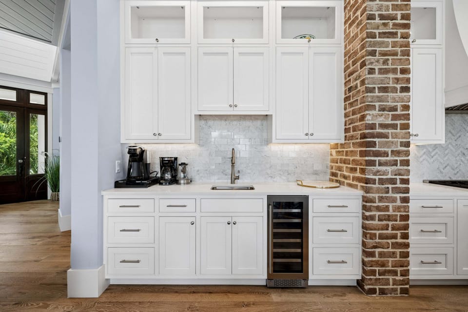Dedicated coffee and beverage nook with additional prep and storage space