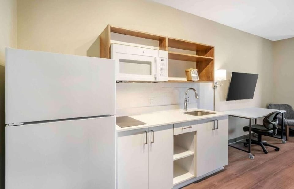 Brew, prep, and snack easily with microwave and sink.