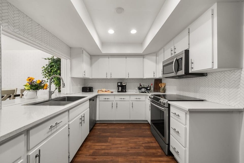 Kitchen | Electric Range | Coffee Station & Stainless Steel Appliances