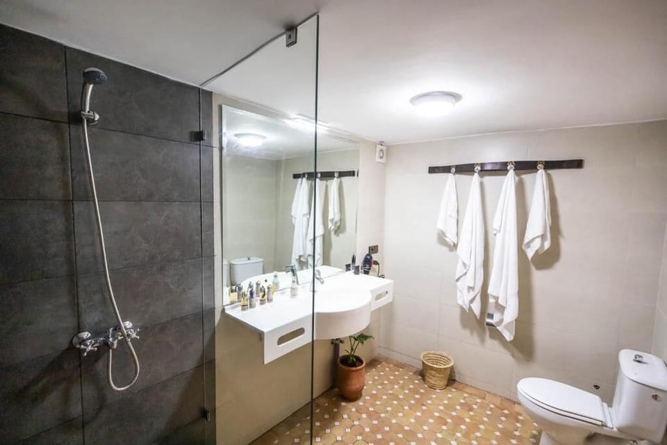 Deluxe Double or Twin Room, Patio, Courtyard View | Bathroom | Bathrobes, slippers, bidet