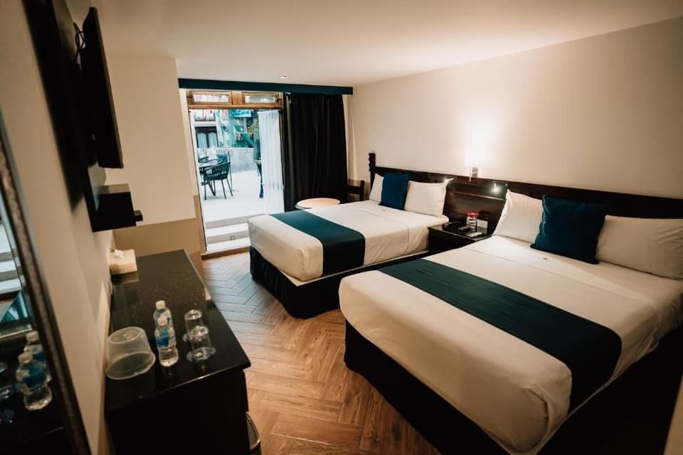 Comfort Double Room, Pool View | In-room safe, blackout drapes, soundproofing, iron/ironing board