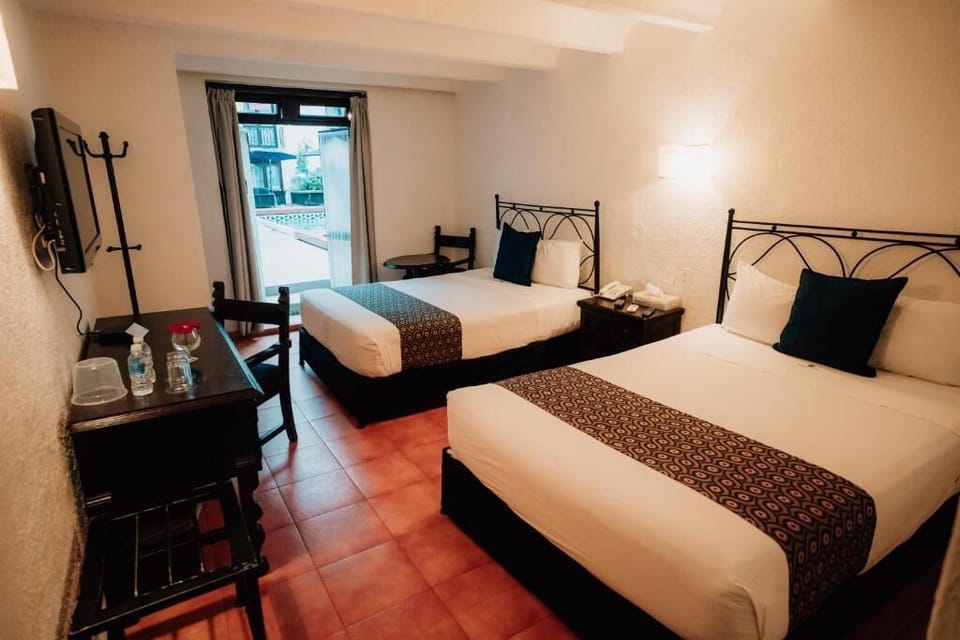 Standard Room, Balcony, Pool View | In-room safe, blackout drapes, soundproofing, iron/ironing board