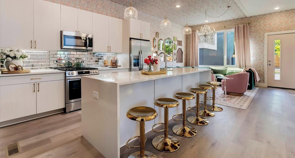 Large luxurious kitchen island that sits up to 6.