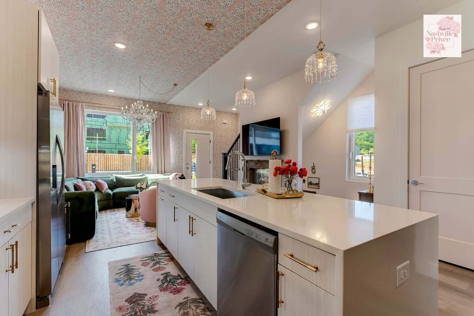 Fully stocked and modern kitchen with dishwasher.