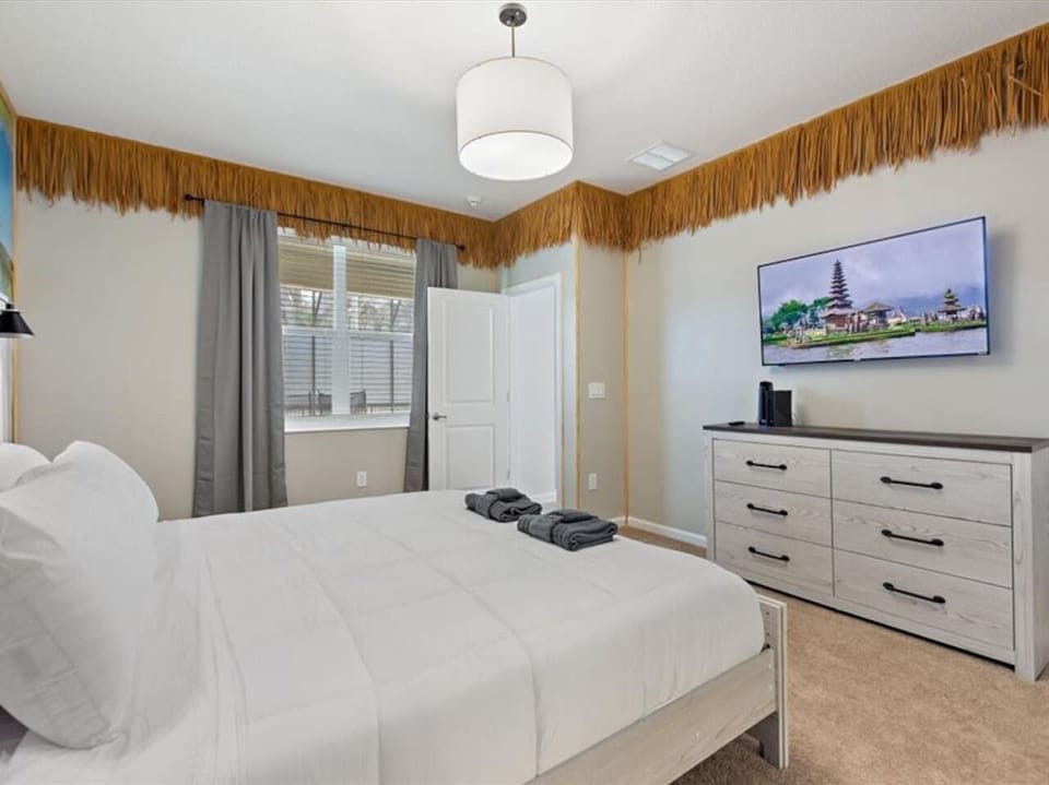 Bedroom #3, (Main Floor) Hawaiian Suite, King bed, with attached bathroom.