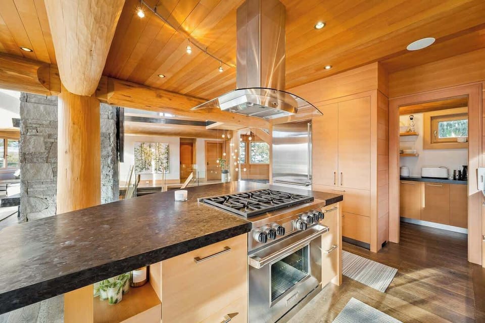 High spec kitchen with a pantry located in the back. 