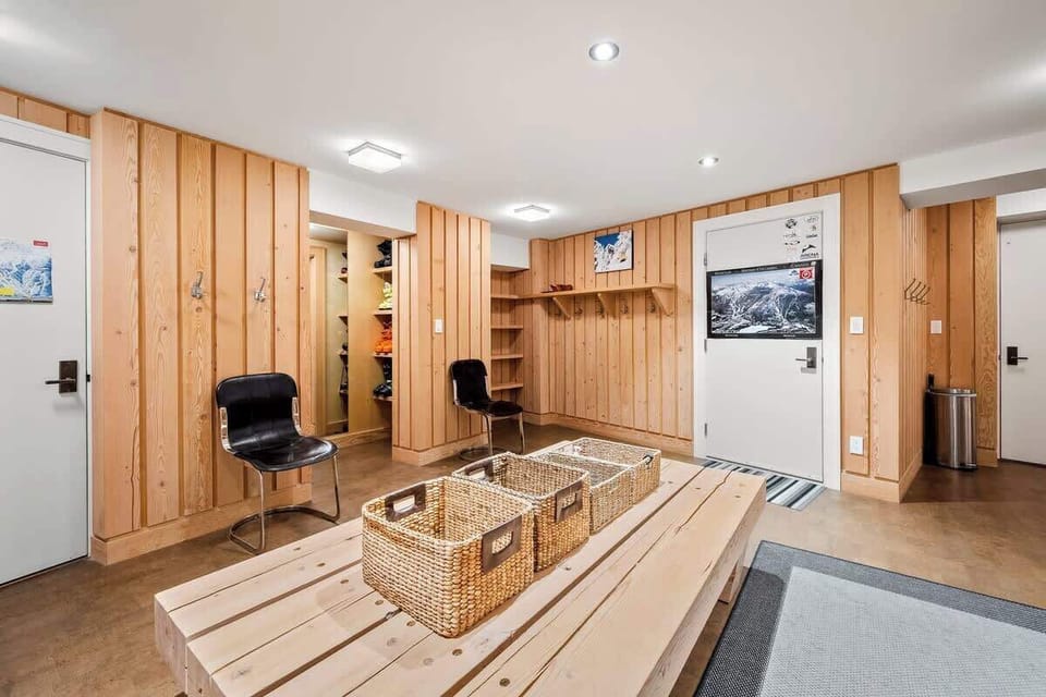 Mudroom on the ground floor, access through the garage with lots of storage for ski equipment, sauna located just off this room and leads through into a laundry area with a washer and dryer and into the media room (bedroom 7). 