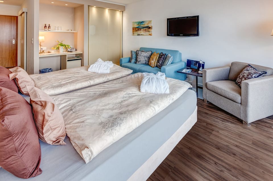 Basic Double Room, Sea View | Hypo-allergenic bedding available, minibar, in-room safe