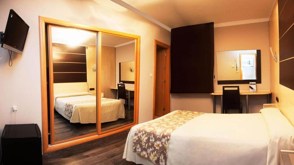 Family Room | Hypo-allergenic bedding, in-room safe, desk, free WiFi