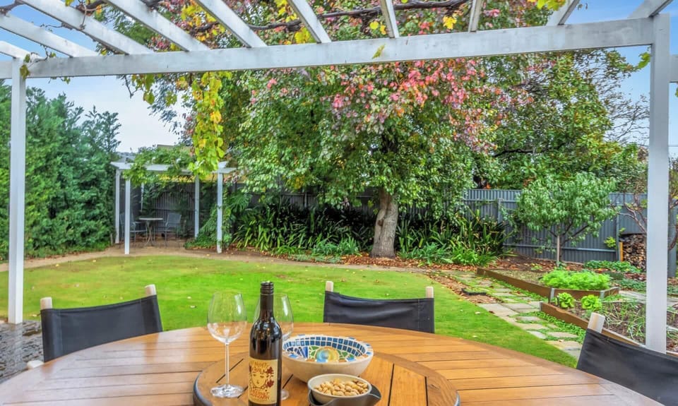 Outdoor dining overlooking the back garden