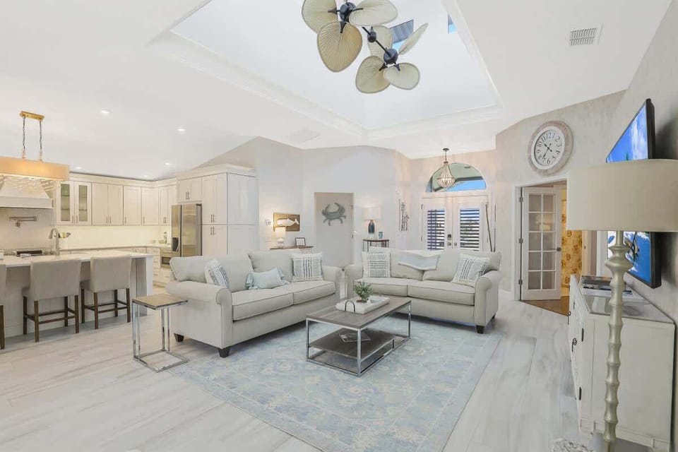 Open and spacious family room where everyone congregates and makes family memories.   Large Island kitchen where meals can be served or family members enjoy a delicious gourmet meal.  Kitchen is fully stocked with every imaginable item needed!