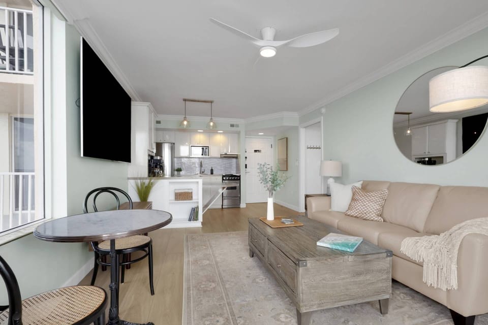 The open layout creates a relaxed and welcoming atmosphere where the living, dining, and kitchen spaces flow effortlessly together.