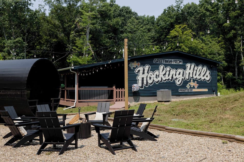 Backyard (sauna, mural, Adirondack chairs, fire pit, string lights)