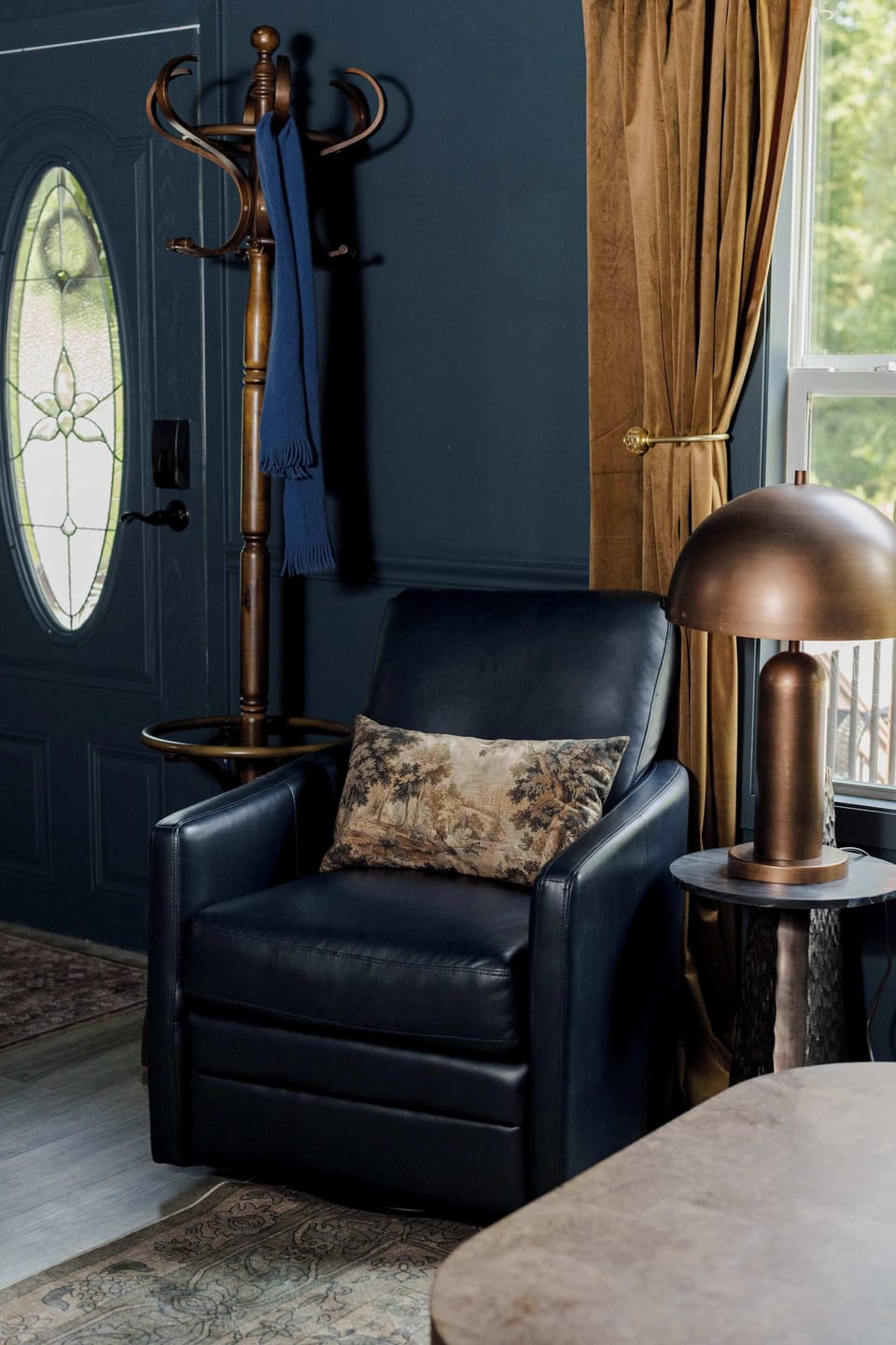 Swivel accent chair in living room with reading light