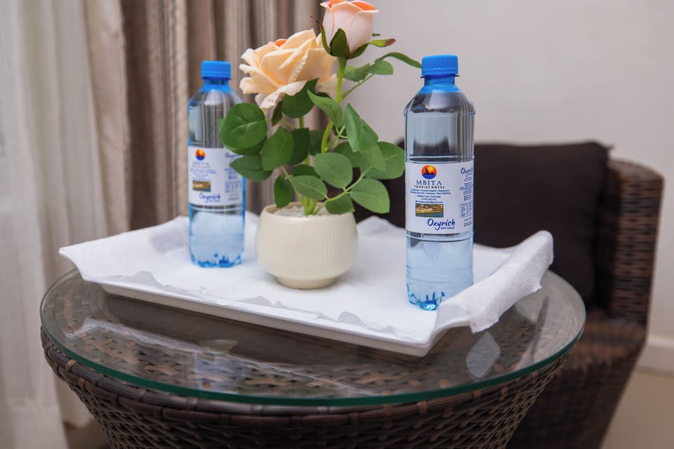 Standard Double Room, Garden View | Bathroom amenities | Shower, slippers, towels, soap