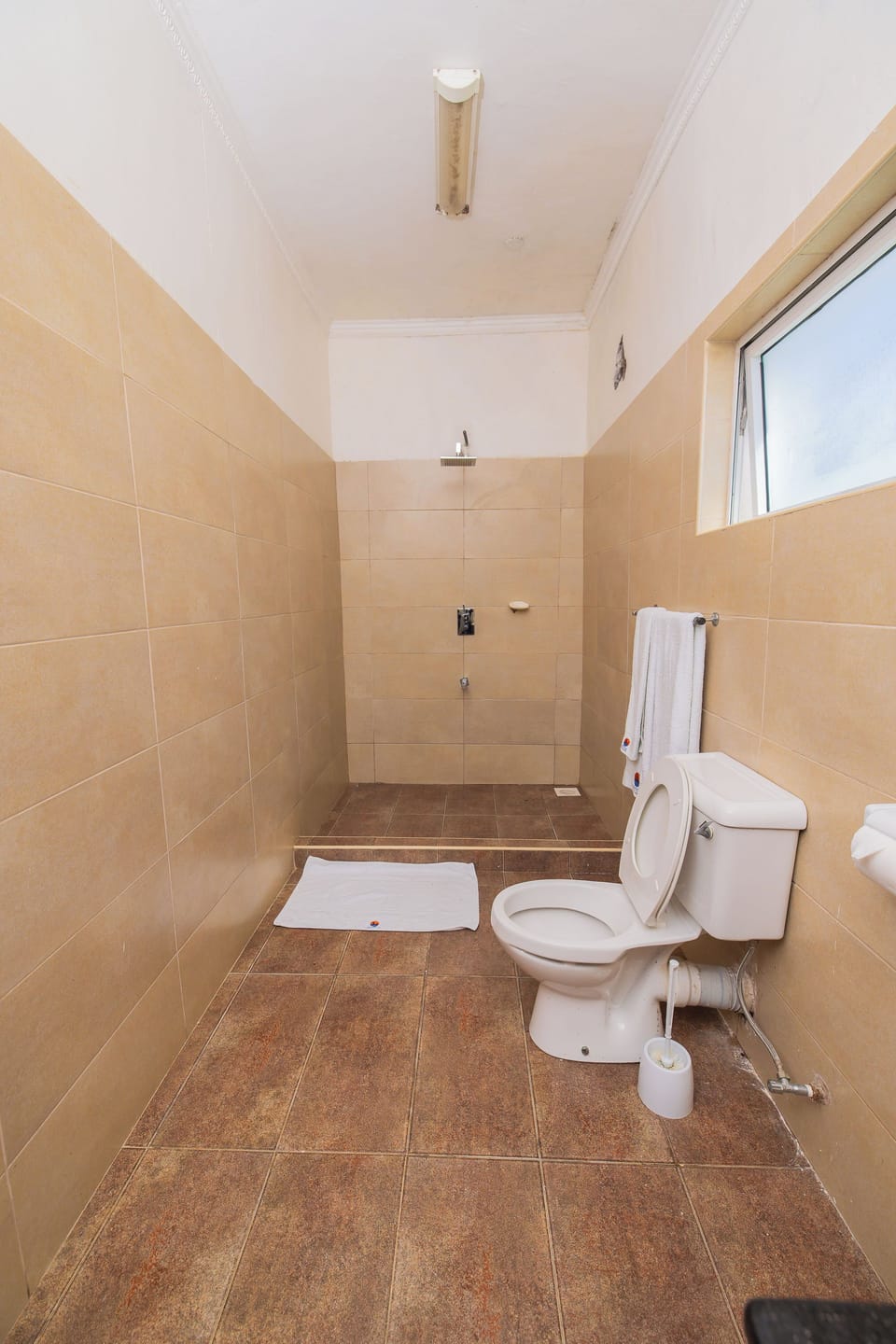 Standard Double Room, Garden View | Bathroom | Shower, slippers, towels, soap