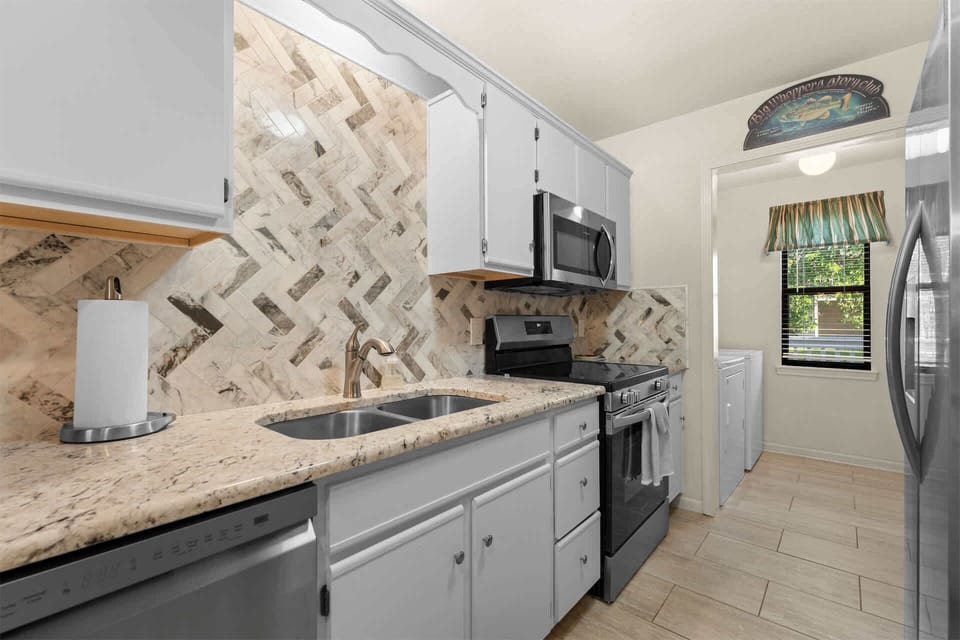 The open kitchen is well equipped for an unforgettable getaway​