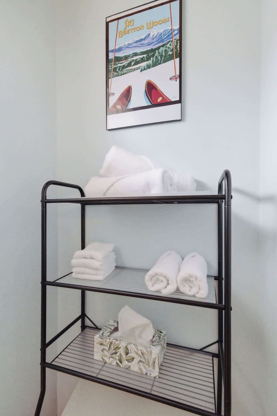Simple mountain-inspired decor and stocked linens add a welcoming touch to the space.
