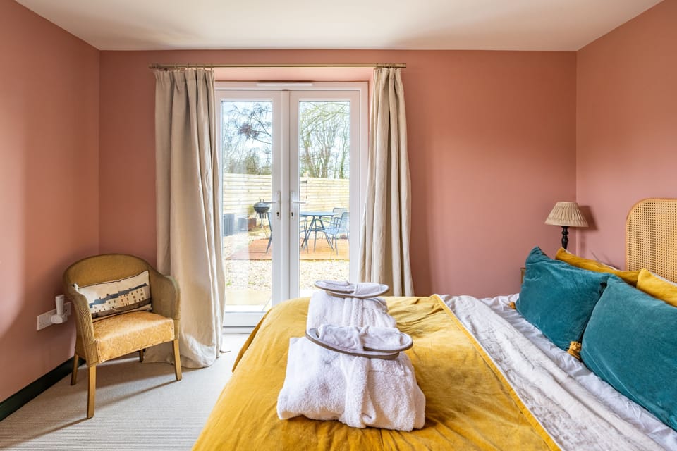 Ground floor: French doors from the bedroom open to the garden