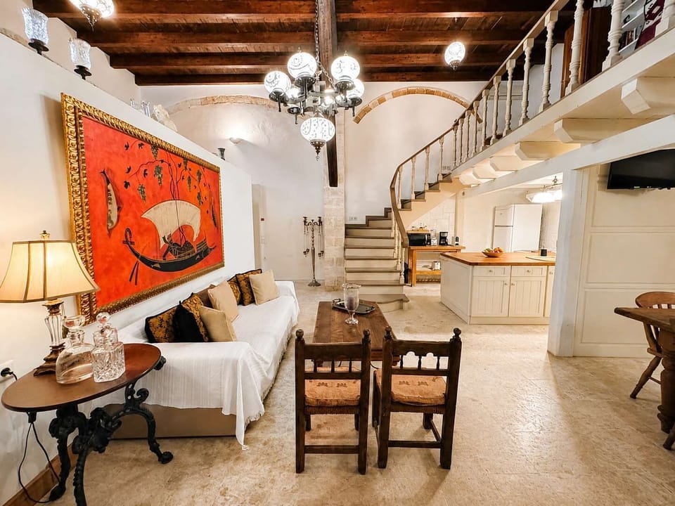 Cozy living area with sofa and solid wood furniture, creating a warm and elegant atmosphere